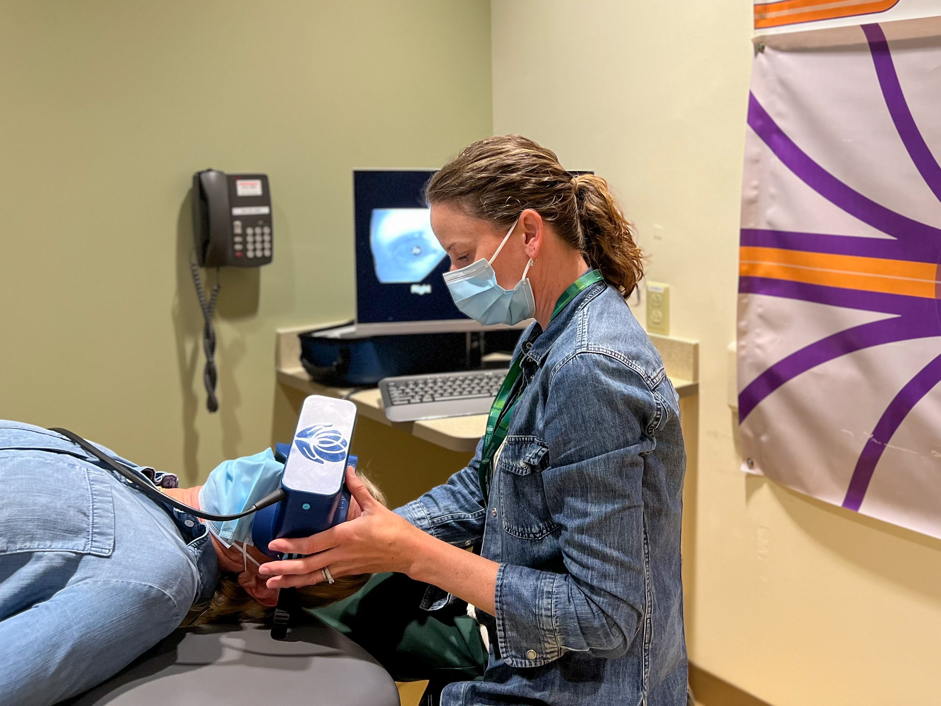 Julia Noreika, PT, DPT, testing a patient experiencing dizziness