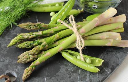 Veggies and peas on a slate