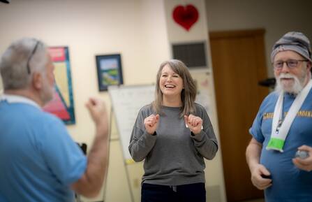 Kristen Frechette, RN, works with two cardiology and cardiac rehabilitation patients