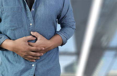 Man holding his stomach